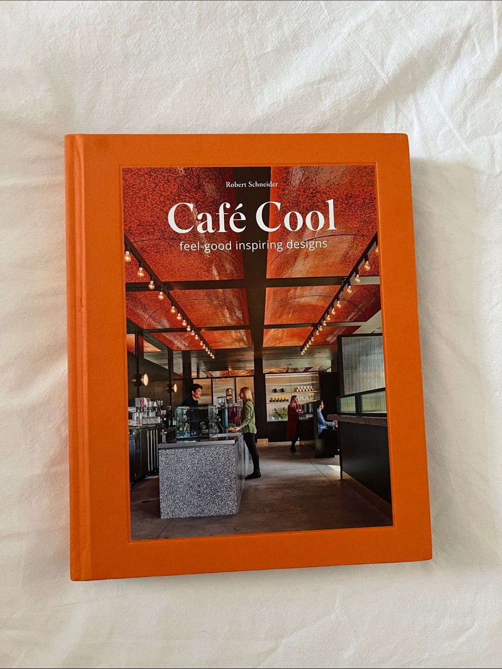 Schneider Café Cool — Bright Orange Hardcover Coffee Shop Design